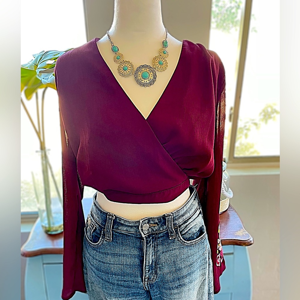Charlotte Russe bell sleeve crop top with open back